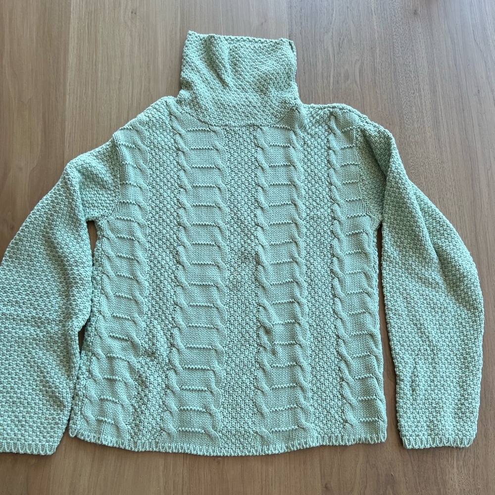 A Knitch Above turtle neck sweater